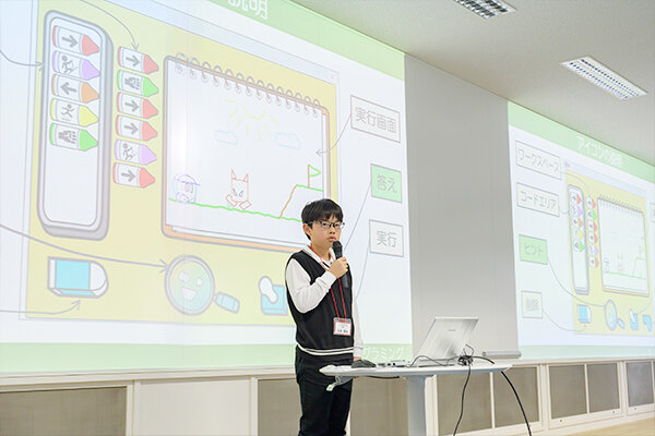 発表中の谷本さん